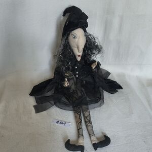 Intricate Black Lace Witch Doll with Intricate Costume And Hat Decoration